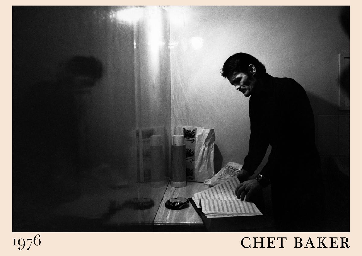 Poster featuring Chet Baker in a moody black and white 1976 photo, reading sheet music, with retro cream border and bold