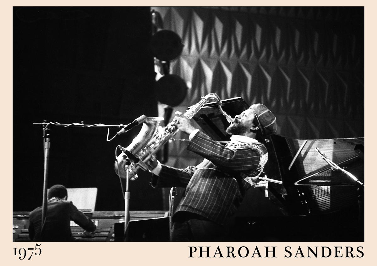 Poster featuring black and white photo of Pharoah Sanders playing saxophone on stage in 1975, retro jazz wall art with