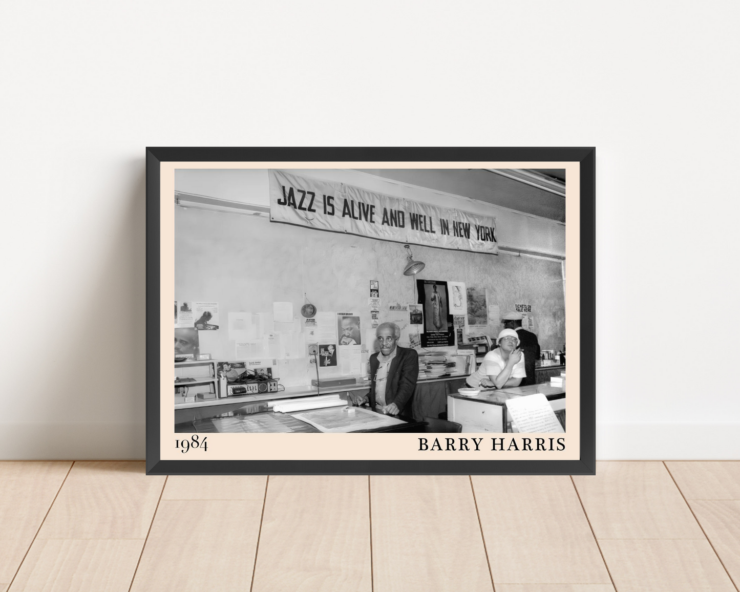 Barry Harris Retro Jazz Poster in landscape mockup, framed on wooden floor, features 1984 black and white jazz scene.