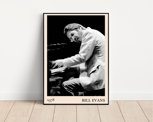 Bill Evans Jazz Concert Print in portrait mockup, black and white 1978 piano photo with cream border, leaning on wood floor