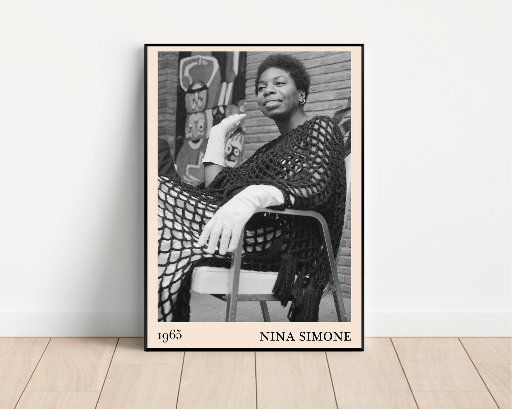 Nina Simone Jazz Print mockup leaning on white wall, black and white portrait design with 1965 date and bold text border