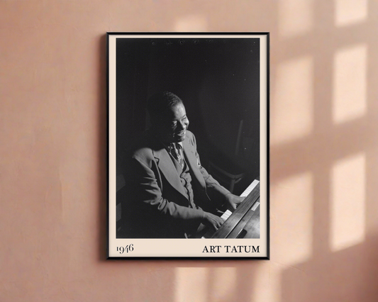 1946 photograph of Art Tatum crafted into a framed jazz poster. The poster has an off-white border and a thin black frame. The poster is hanging on a peach-coloured wall.