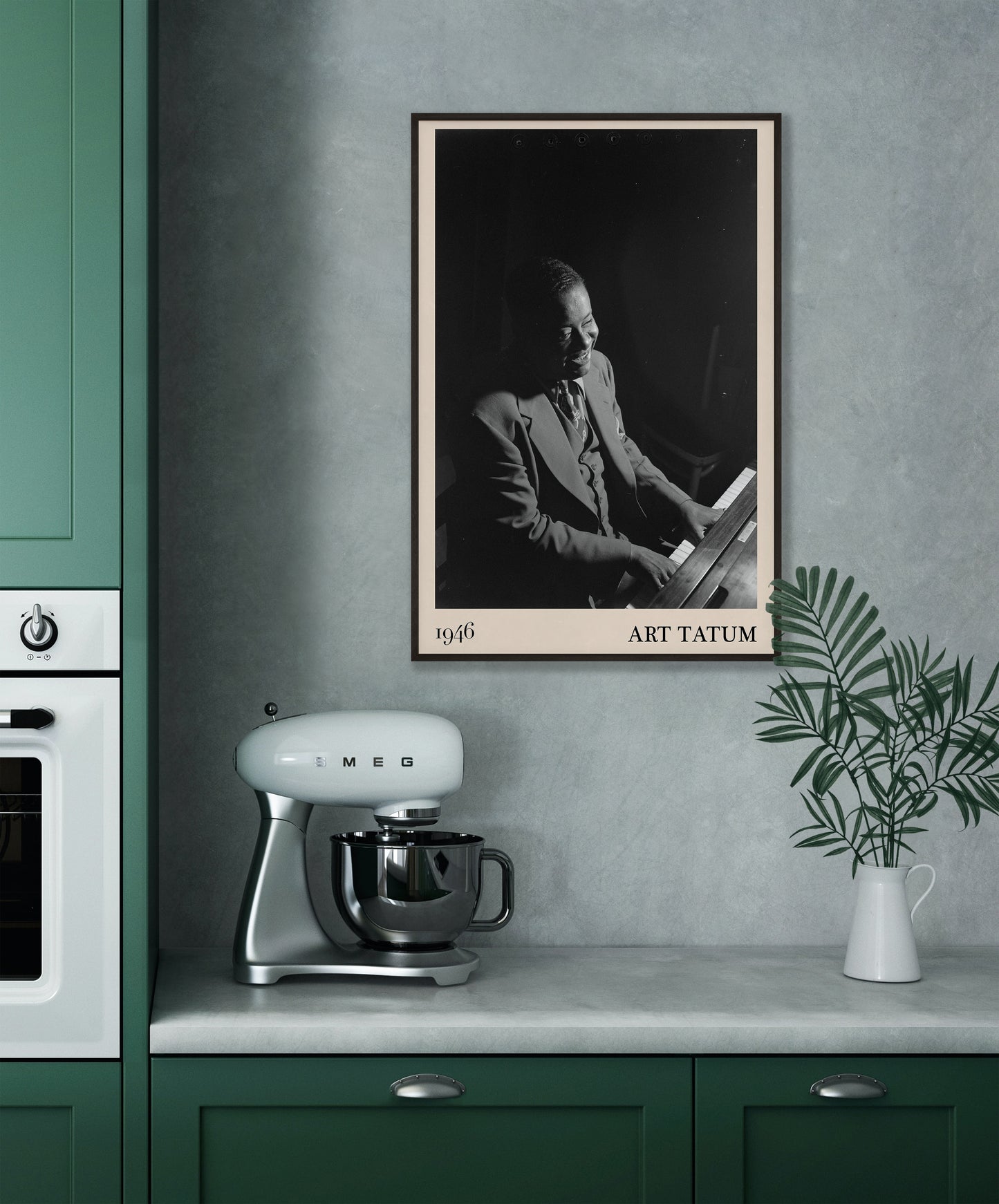 1946 photograph of Art Tatum crafted into a cool framed music poster. The poster has an off-white border and a thin black frame. The poster is hanging on a off-white kitchen wall..