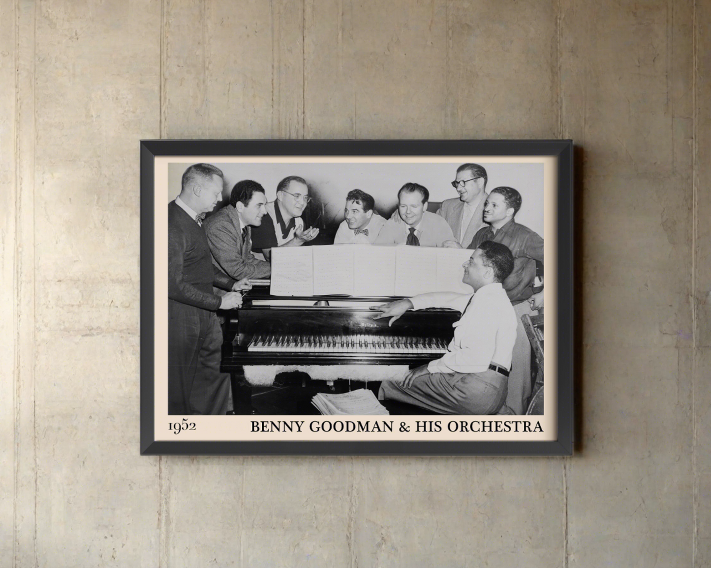 1952 photograph of Benny Goodman & his orchestra crafted into a black framed poster. The poster is hanging on an off white wall