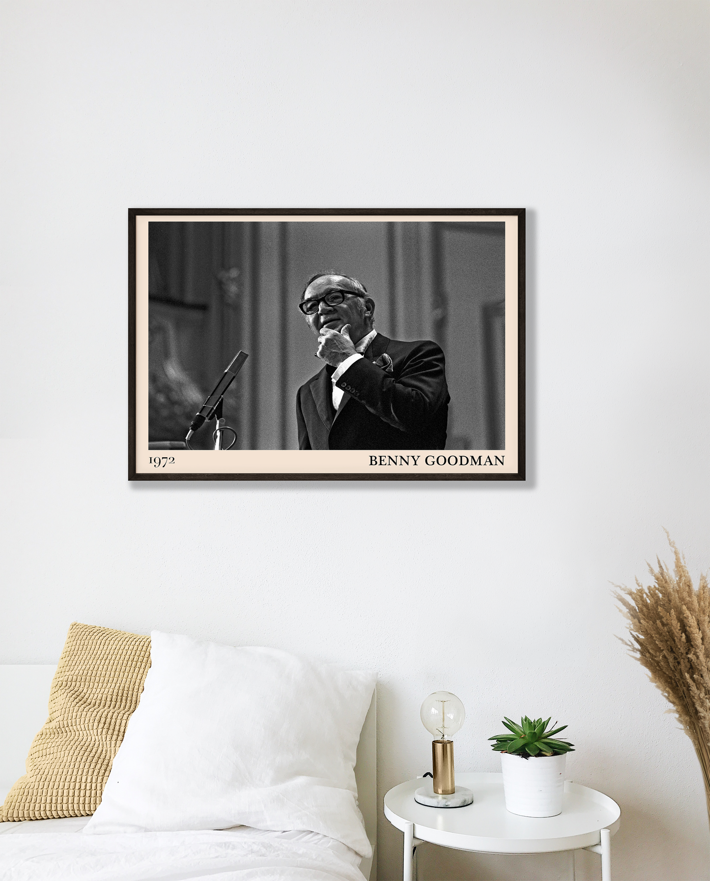 1972 photo of the Benny Goodman crafted into a black framed-poster, hanging on a white bedroom wall