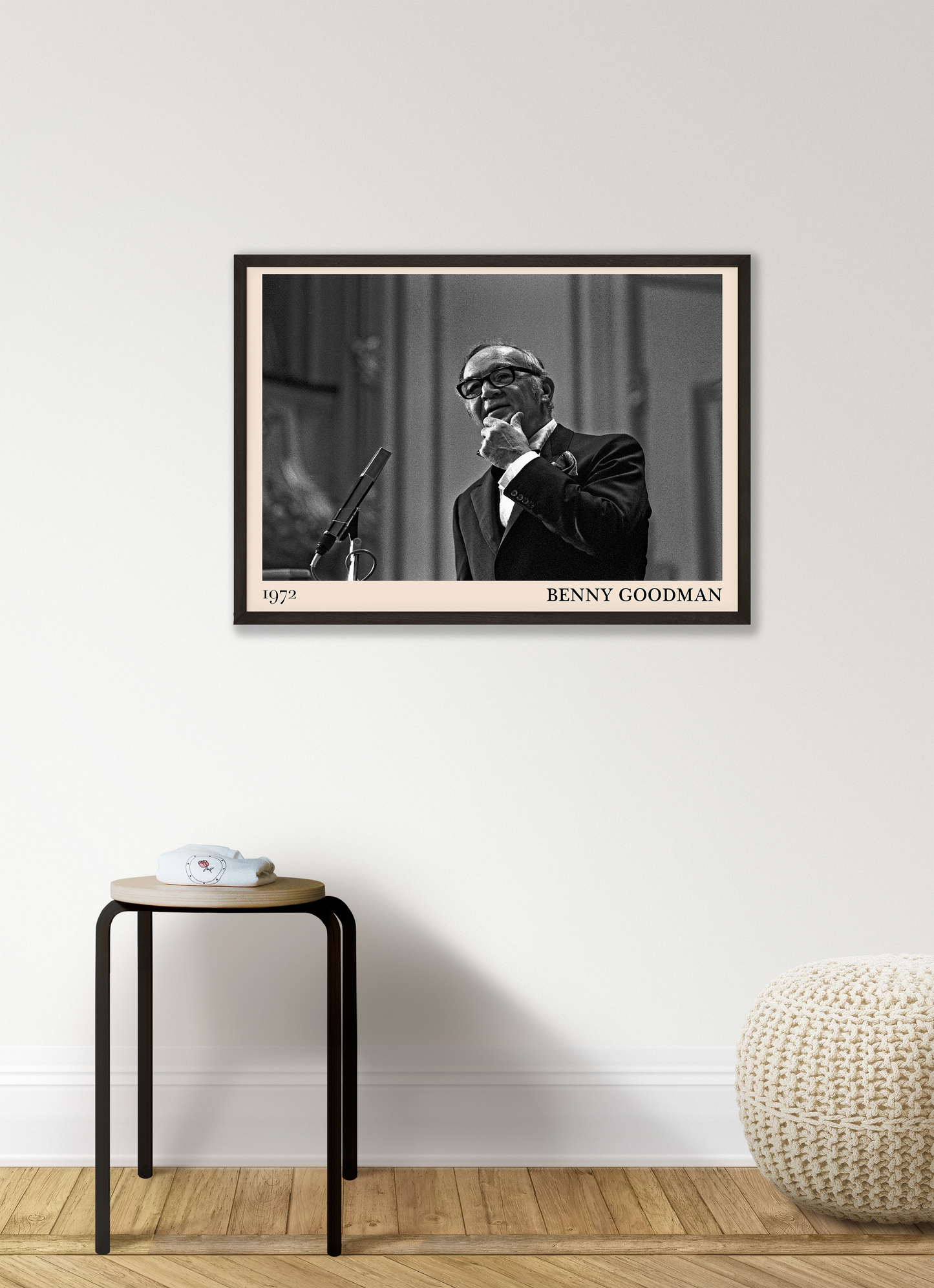 1972 photo of the Benny Goodman crafted into a black framed-poster, hanging on a white living room wall