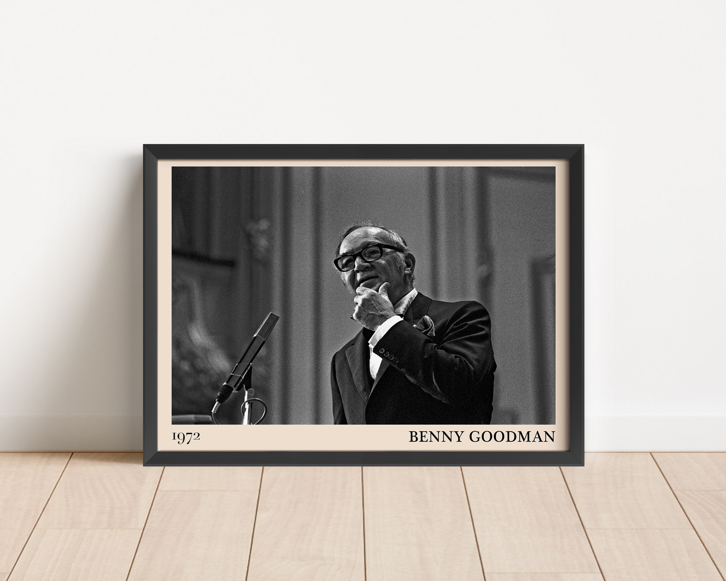 1972 photo of the Benny Goodman crafted into a black framed-poster, leaning against a white wall