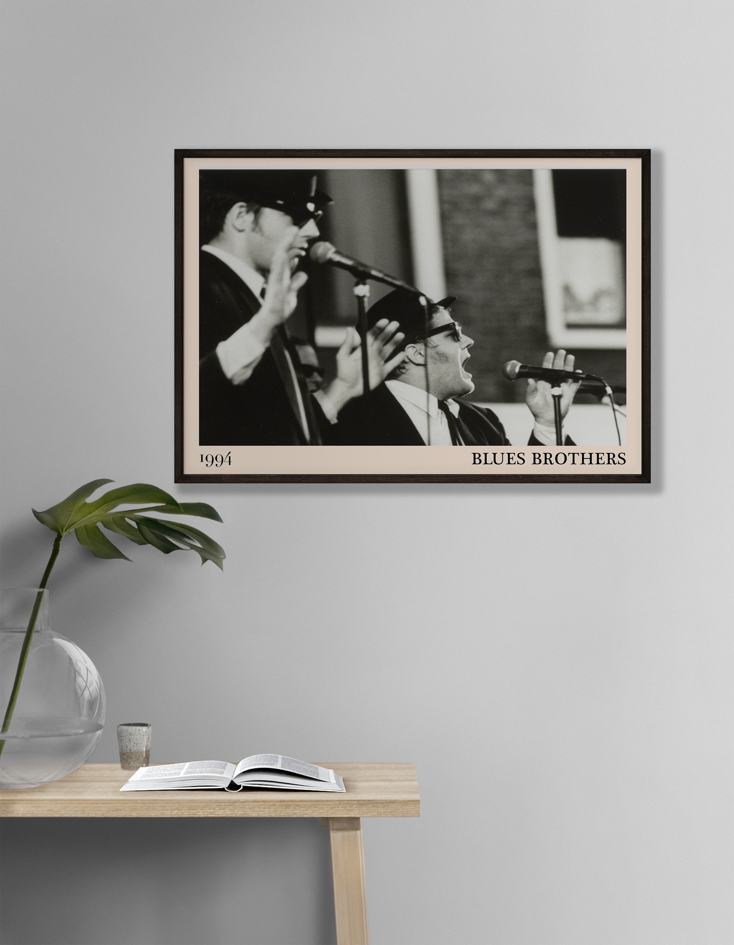 The Blues Brothers blues print hanging on a white living room wall