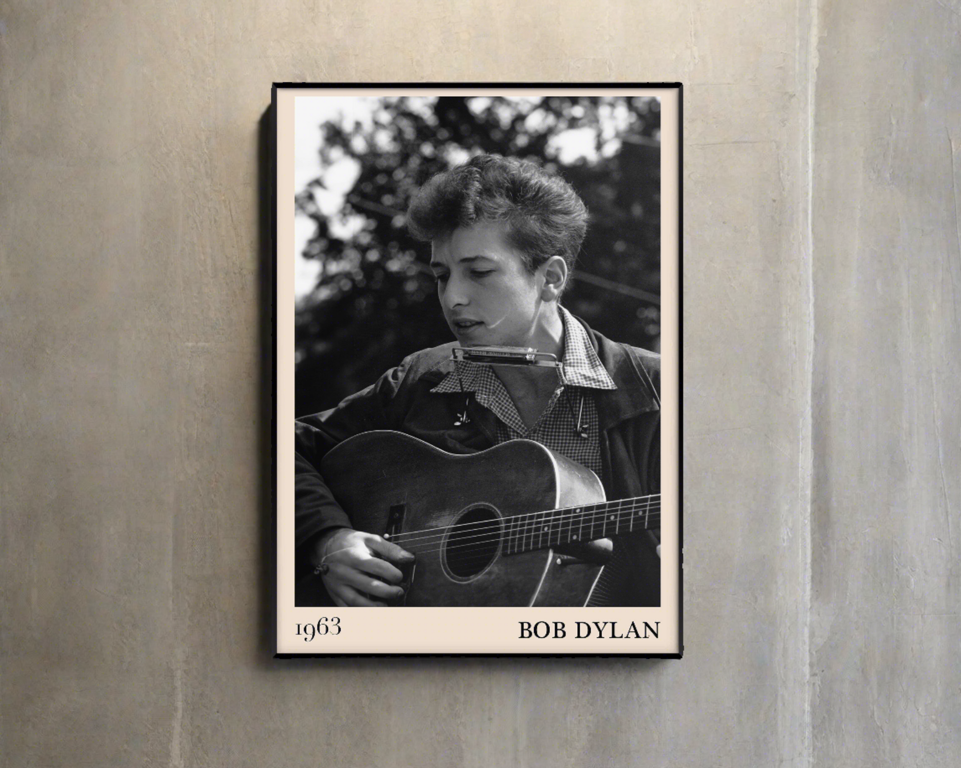 1963 photograph of Bob Dylan playing blues guitar crafted into cool framed blues poster, hanging on a grey/brown wall