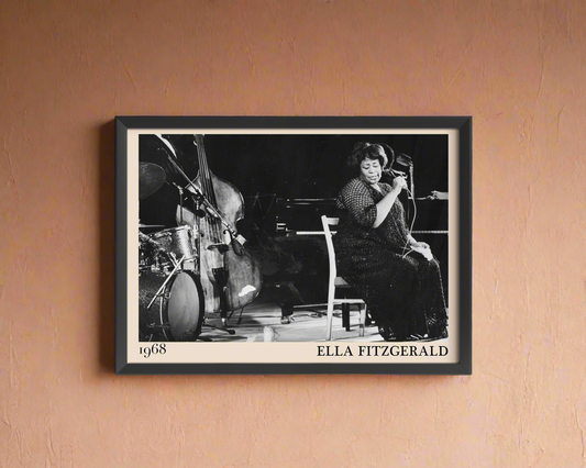 1968 photo of Ella Fitzgerald crafted into an elegant black-framed print. Hanging on a peach coloured wall