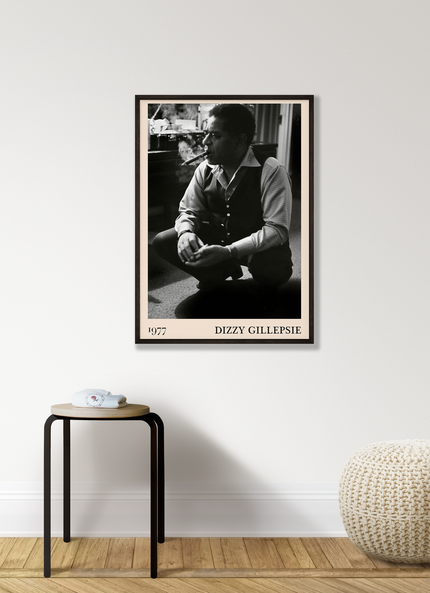 Vintage 1977 photo of Dizzy Gillespie crafted into black framed poster, hanging on a white living room wall