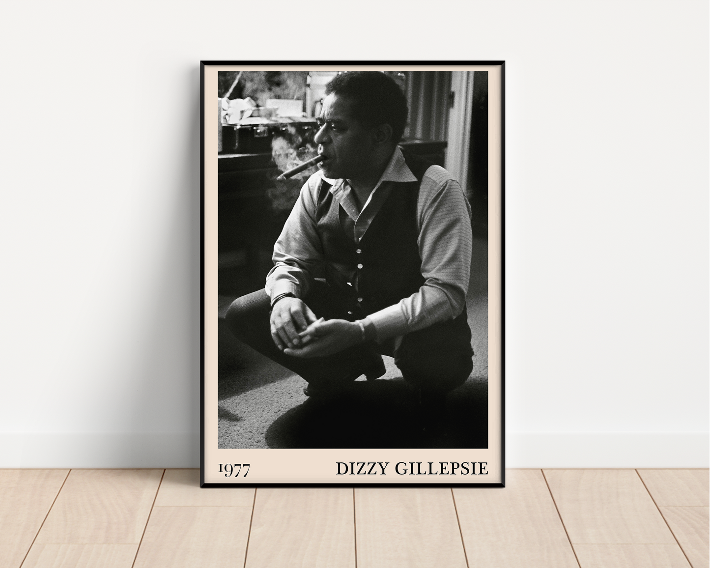 Vintage 1977 photo of Dizzy Gillespie crafted into black framed poster, leaning against a white wall