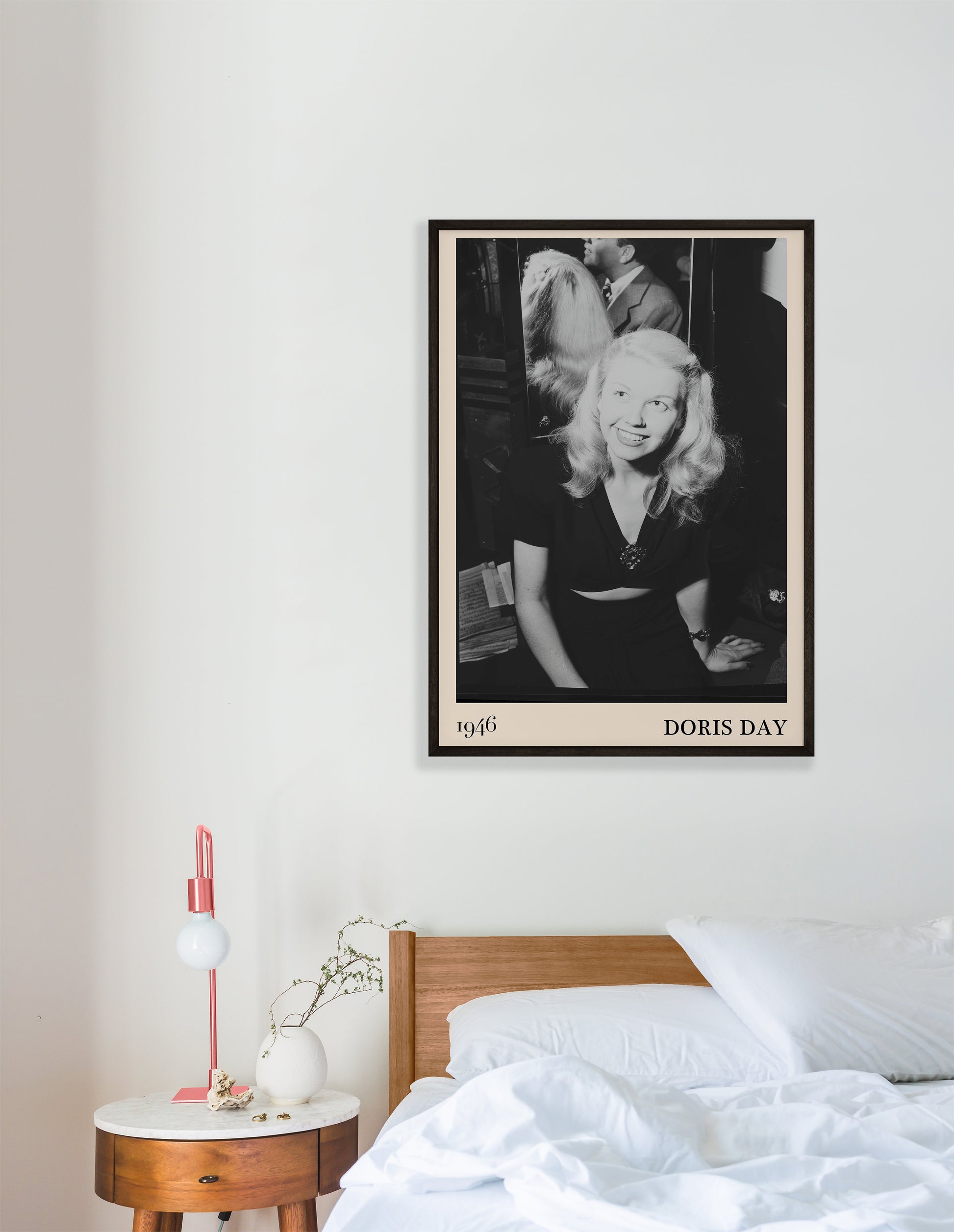1946 photograph of  Doris Day. Transformed into a stylish black-framed jazz poster resting hanging on a white bedroom wall