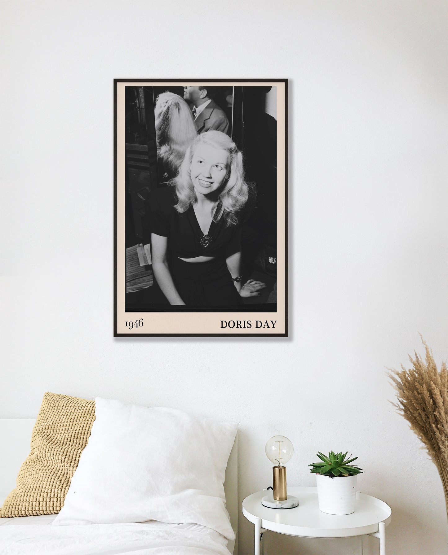 1946 photograph of Doris Day. Transformed into a stylish black-framed jazz poster resting hanging on a white bedroom wall