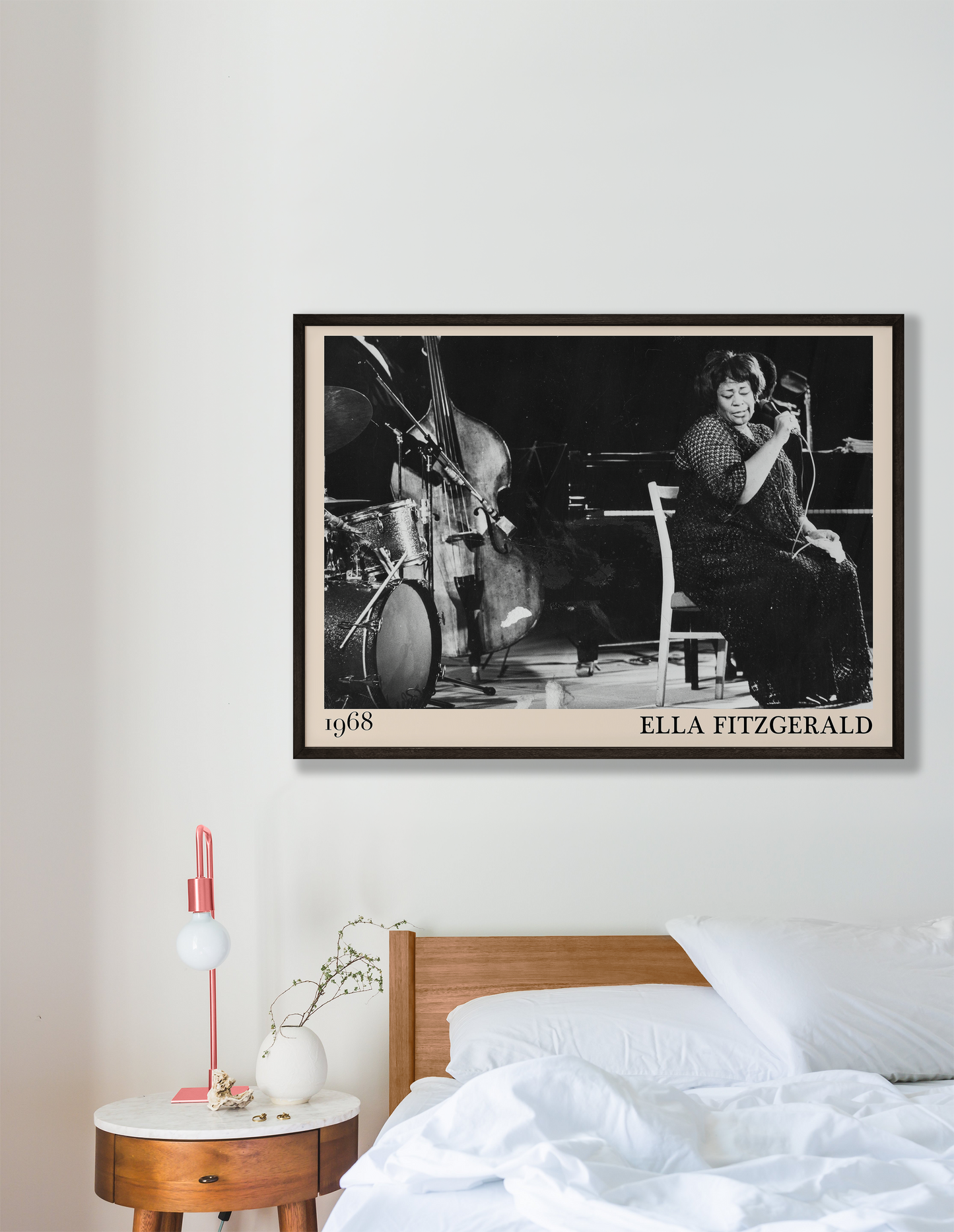 1968 photo of Ella Fitzgerald crafted into an elegant black-framed print. Hanging on a white living room wall