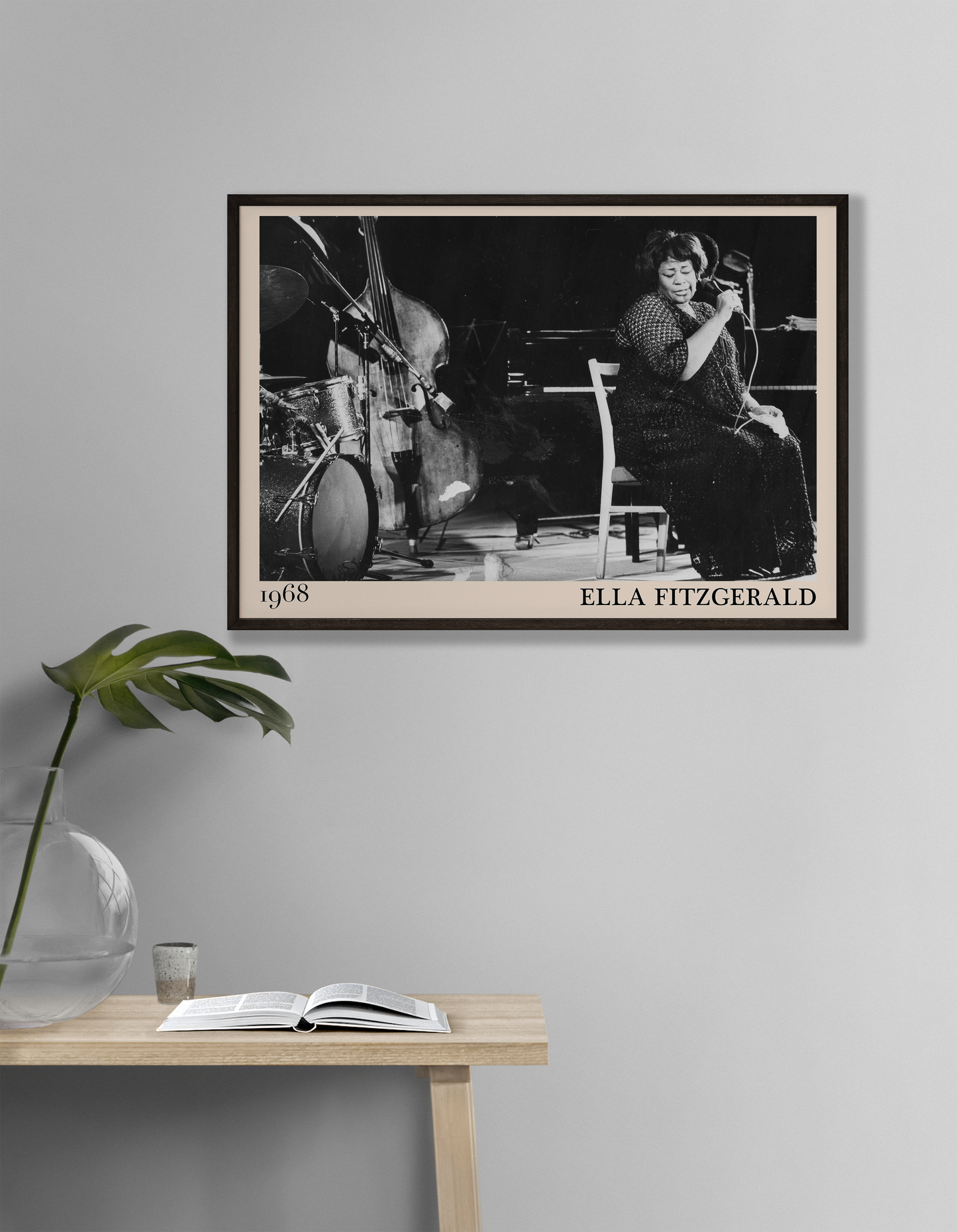 1968 photo of Ella Fitzgerald crafted into an elegant black-framed print. Hanging on a white living room wall
