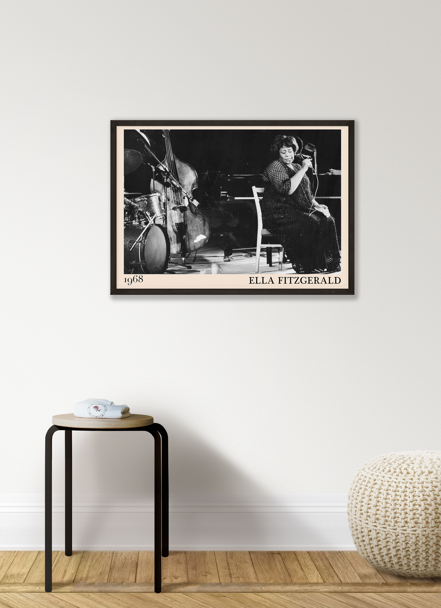1968 photo of Ella Fitzgerald crafted into an elegant black-framed print. Hanging on a white living room wall