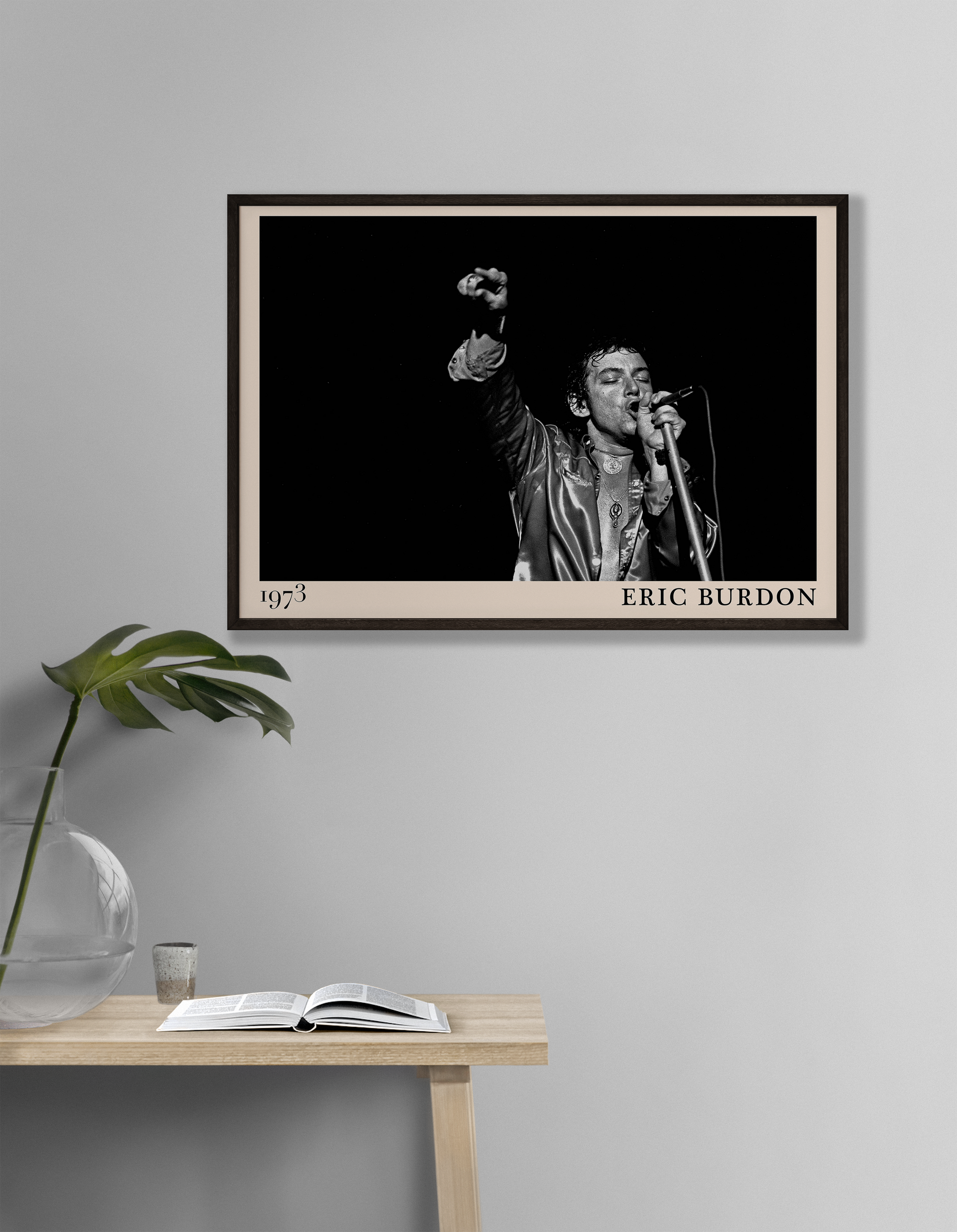 Iconic image of rock musician Eric Burdon performing, captured by Heinrich Klaffs in 1973 and transformed into vintage-inspired wall decor hanging on a white living room wall