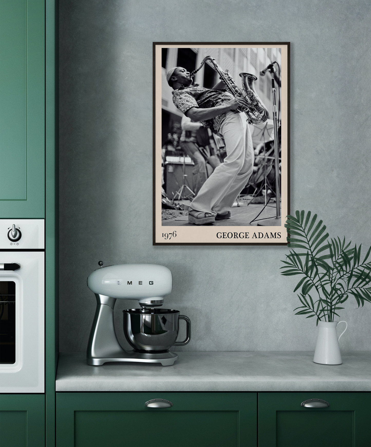 1976 photograph of George Adams taken by Thomas Marcello. Picture crafted into a cool black framed jazz print, with an off-white border. Poster is hanging on a grey kitchen wall.