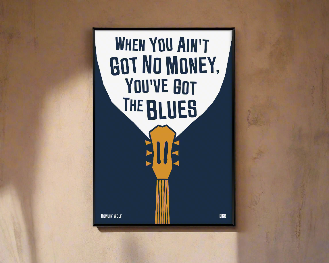 Cool blues music poster with guitar design, featuring a Howlin' Wolf quote. Retro black frame print, leaning against a white wall, perfect home decor.