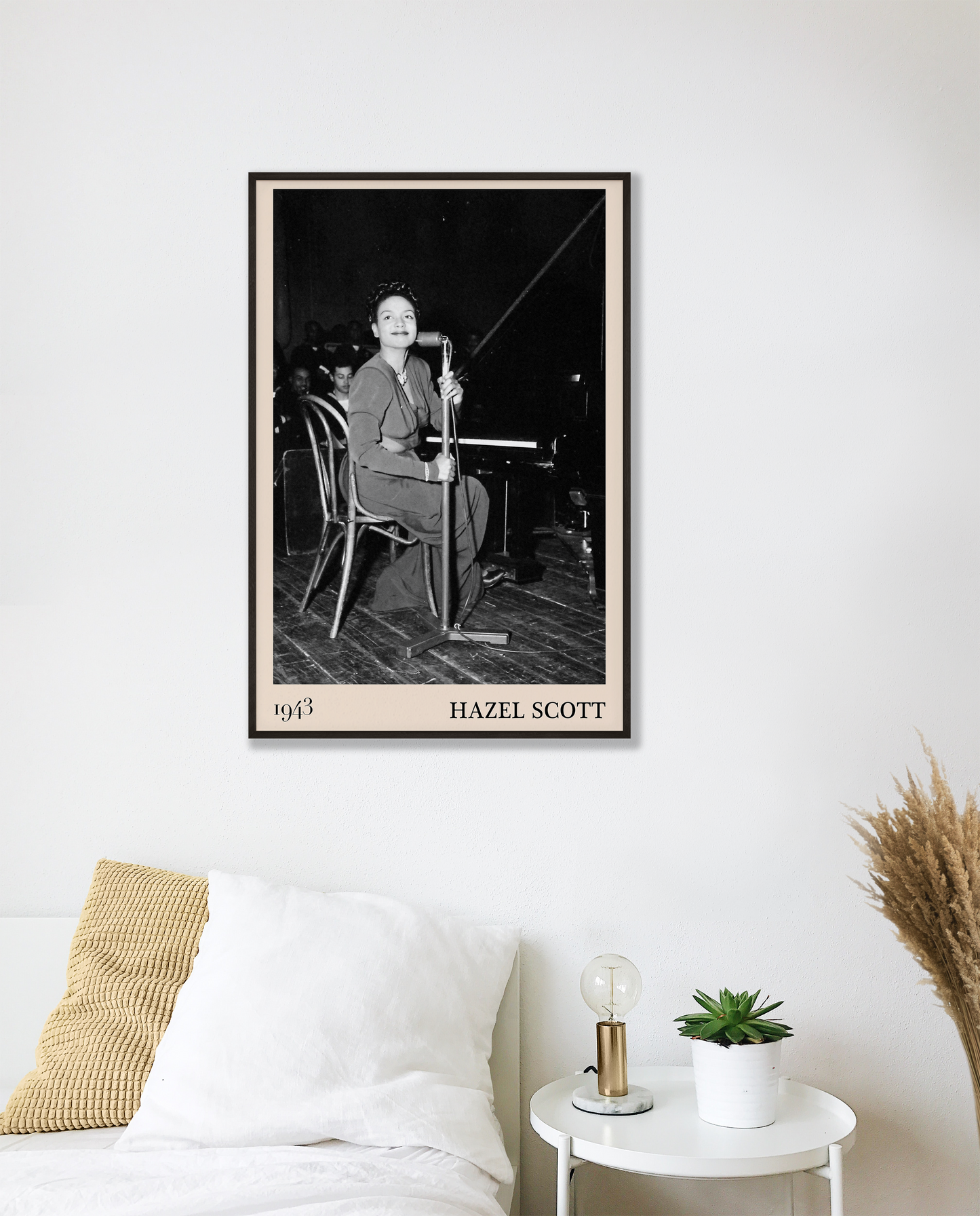 1943 photo of Hazel Scott crafted into a black framed-poster, hanging on a white bedroom wall