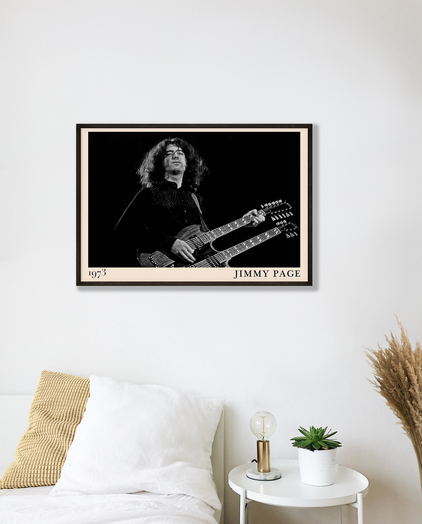 Iconic image of rock guitarist Jimmy Page performing, captured by Heinrich Klaffs and transformed into vintage-inspired wall decor hanging on a white bedroom wall