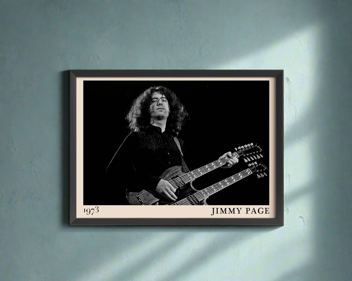 Iconic image of rock guitarist Jimmy Page performing, captured by Heinrich Klaffs and transformed into vintage-inspired wall decor on a light blue concrete wall in dappled sunlight