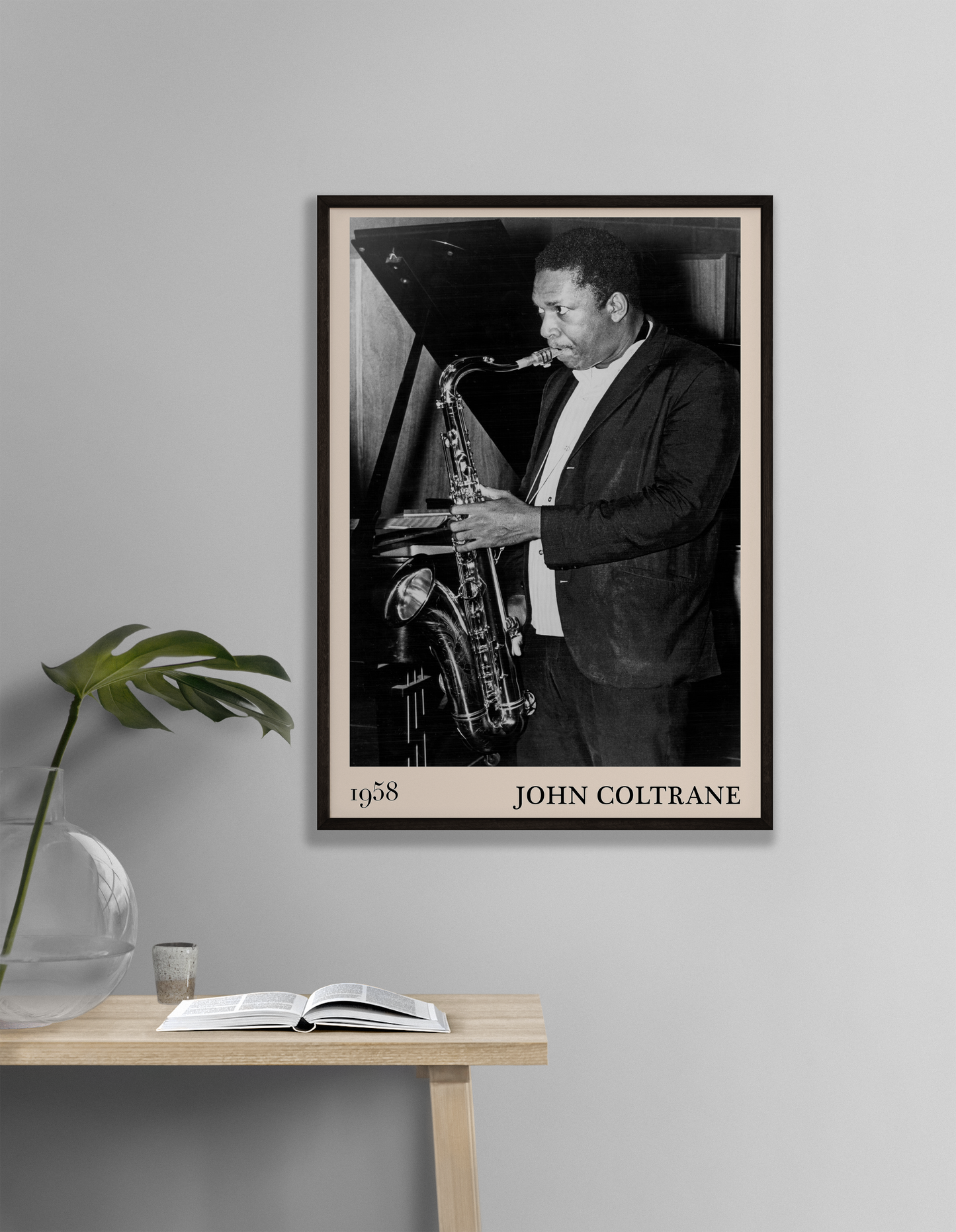 Iconic image of John Coltrane performing transformed into vintage-inspired wall decor hanging on a white living room wall