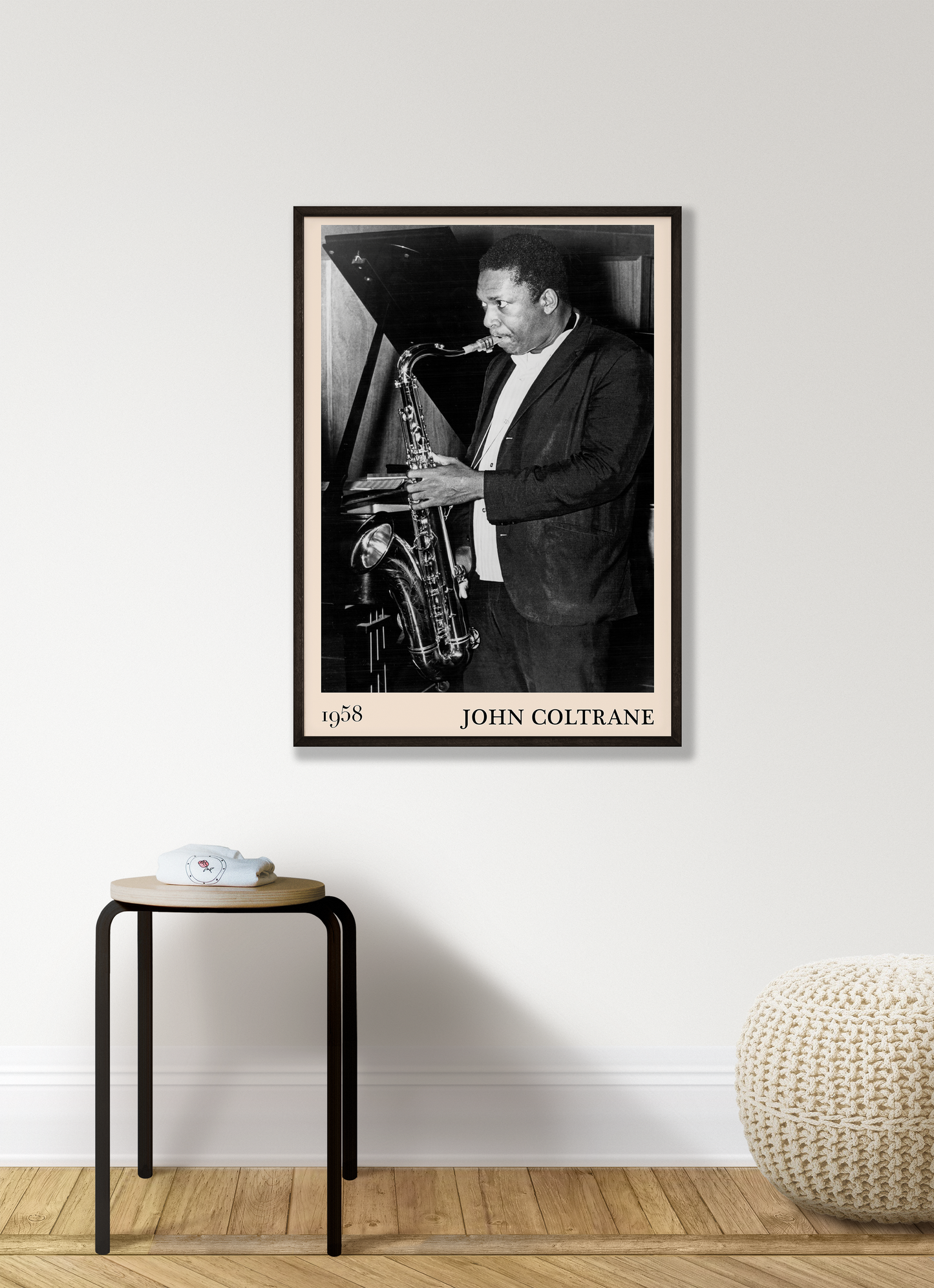 Iconic image of John Coltrane performing transformed into vintage-inspired wall decor hanging on a white living room wall