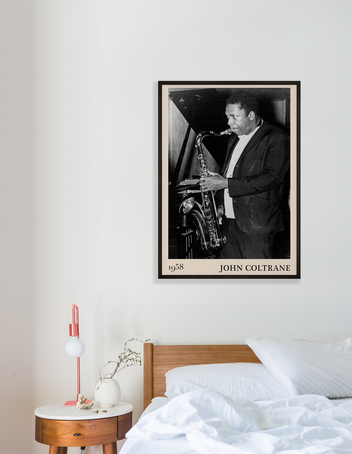 Iconic image of John Coltrane performing transformed into vintage-inspired wall decor hanging on a white bedroom wall