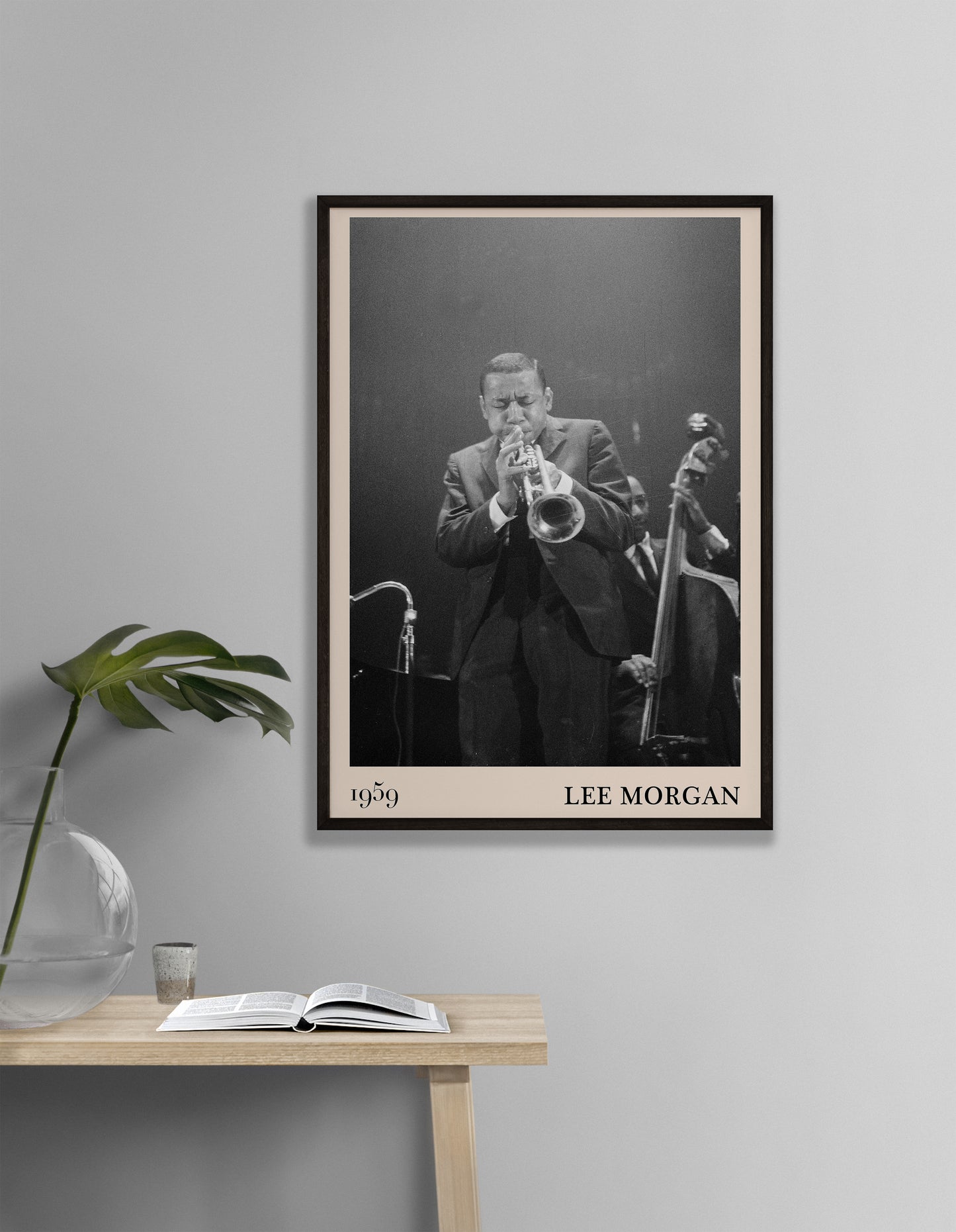 1959 photograph of Lee Morgan playing the Trumpet transformed into a stylish black-framed music poster hanging on a grey bedroom wall
