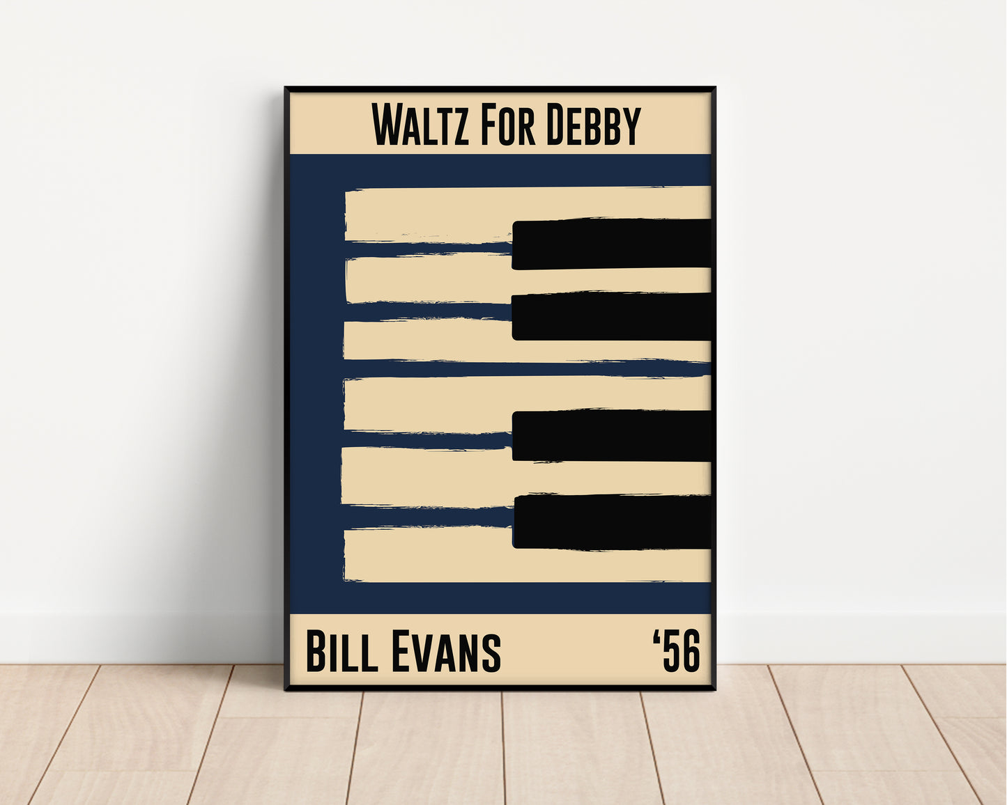 Blue and cream piano design celebrating Bill Evans' Waltz for Debby, released in 1956. Mocked up into black framed print leaning against a white wall