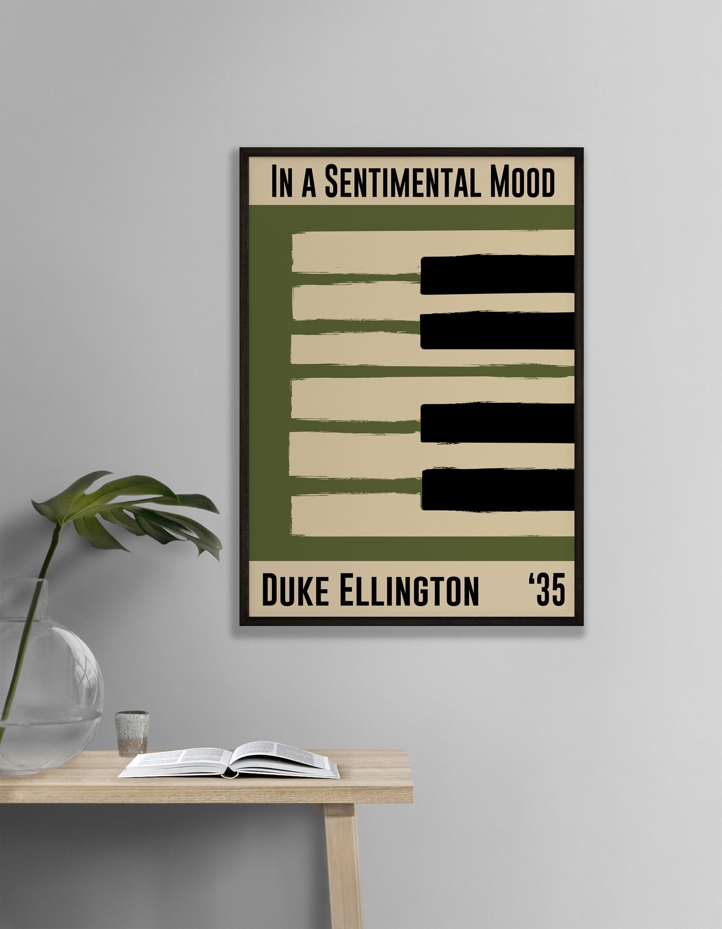 Olive green and cream piano design celebrating Duke Ellington's In A Sentimental Mood, released in 1935. Mocked up into black framed print hanging on a white living room wall