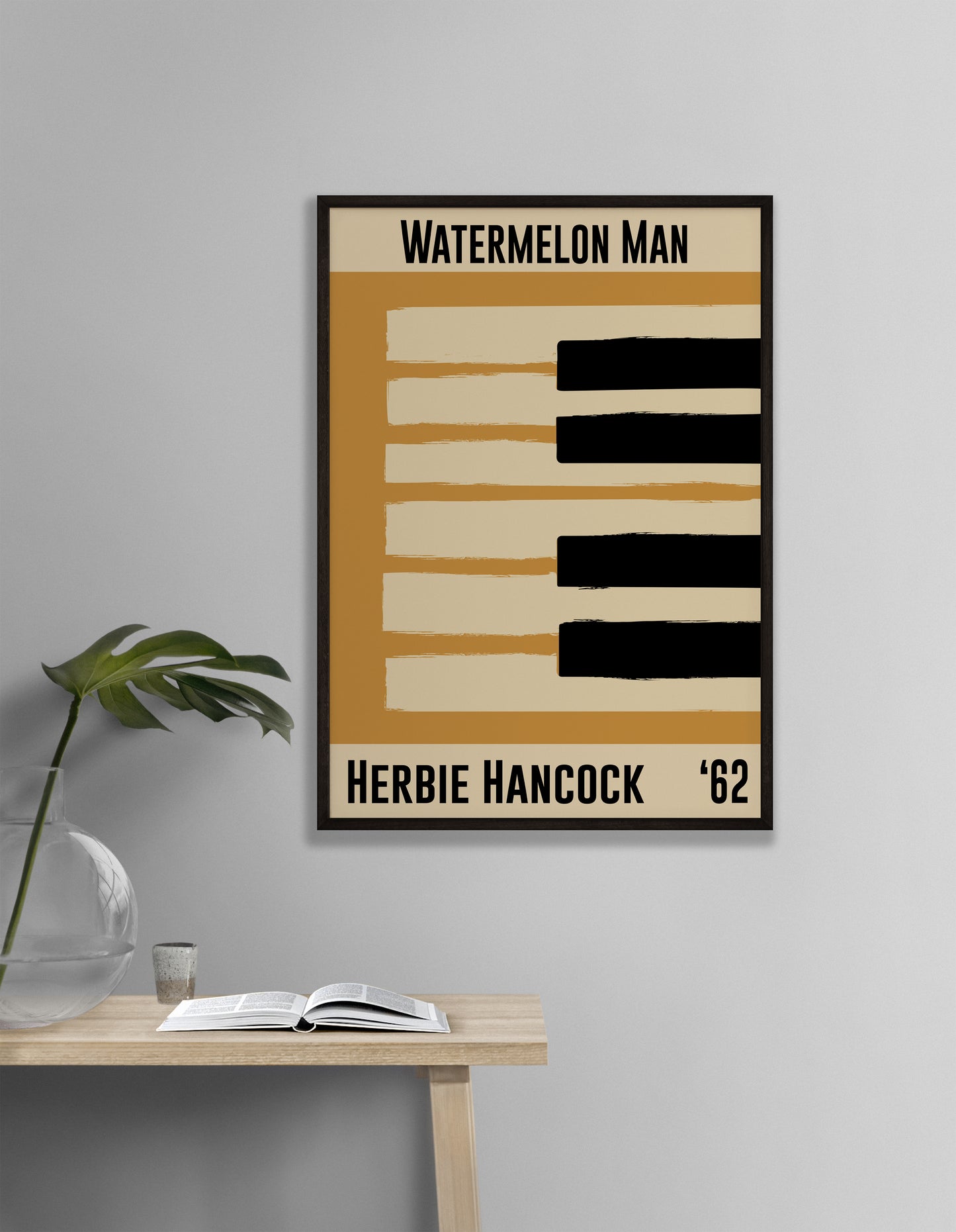 Framed yellow jazz poster featuring a piano design and Herbie Hancock's 1962 number 'Watermelon Man'. Vintage music decor, classic soul art, perfect for jazz and soul enthusiasts and Herbie Hancock fans