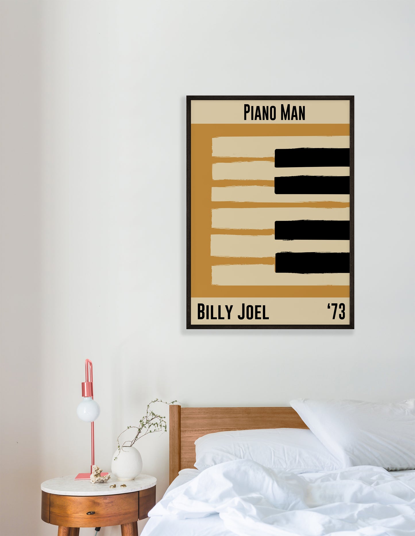 Yellow and cream piano design celebrating Billy Joel's Piano Man, released in 1973. Mocked up into black framed print hanging on white bedroom wall