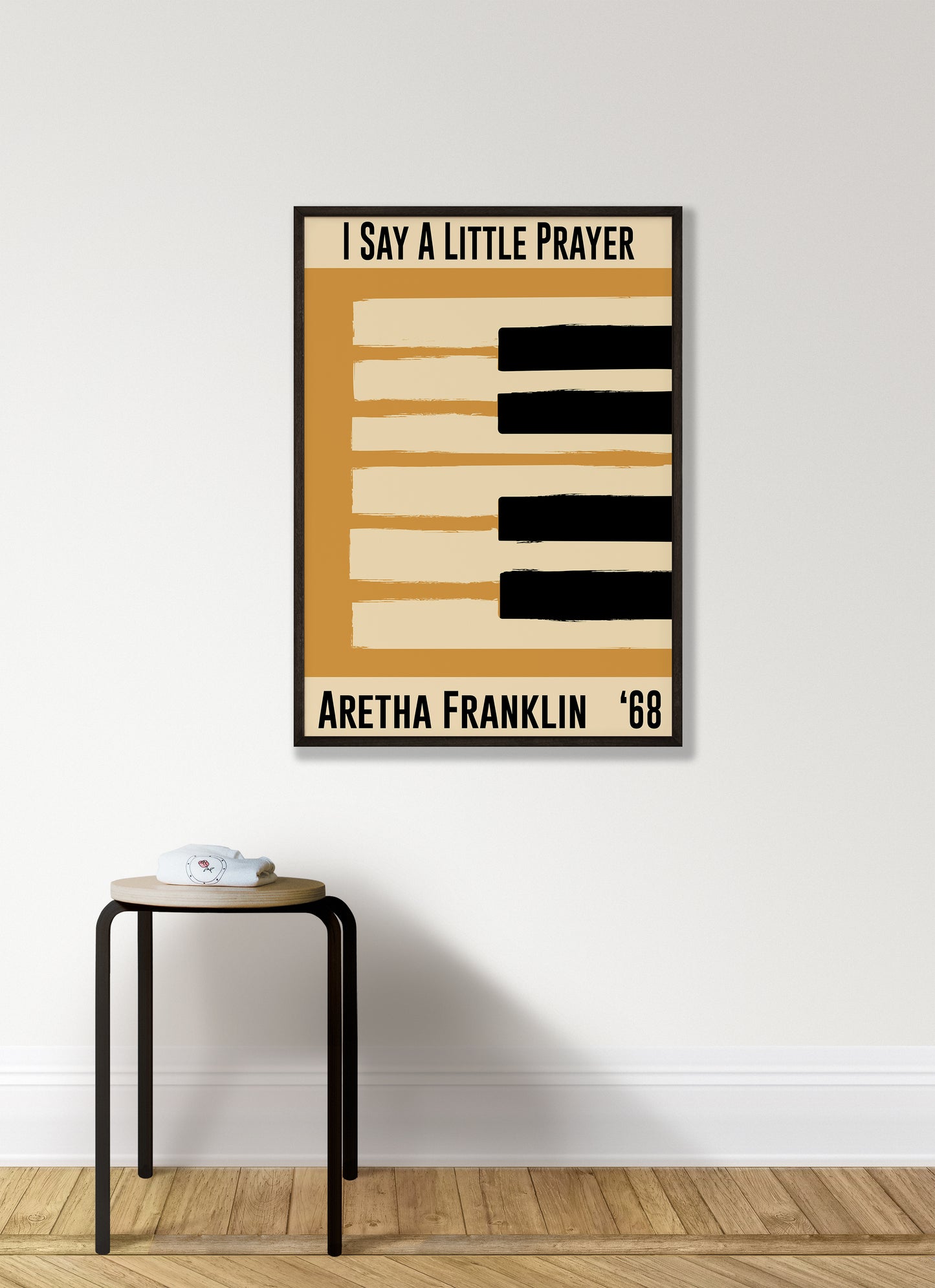 Framed yellow jazz poster featuring a piano design and Aretha Franklin's 1968 song 'I Say a Little Prayer'. Vintage music decor, classic soul art, perfect for jazz and soul enthusiasts and Aretha Franklin fans