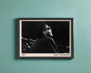 1964 photograph of blues legend Ray Charles, transformed into a stylish black-framed poster hanging on a turquoise wall