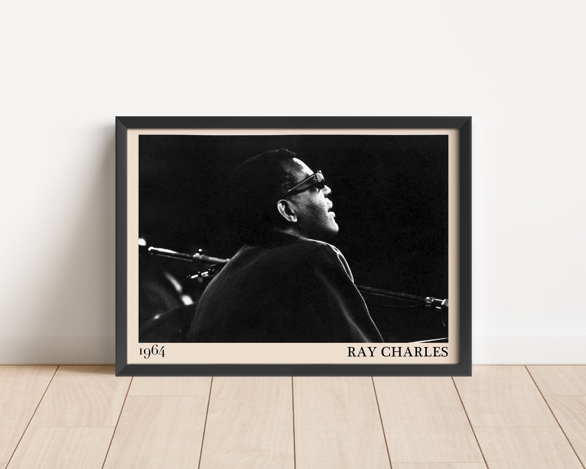 1964 photograph of blues legend Ray Charles, transformed into a stylish black-framed poster leaning on a white wall