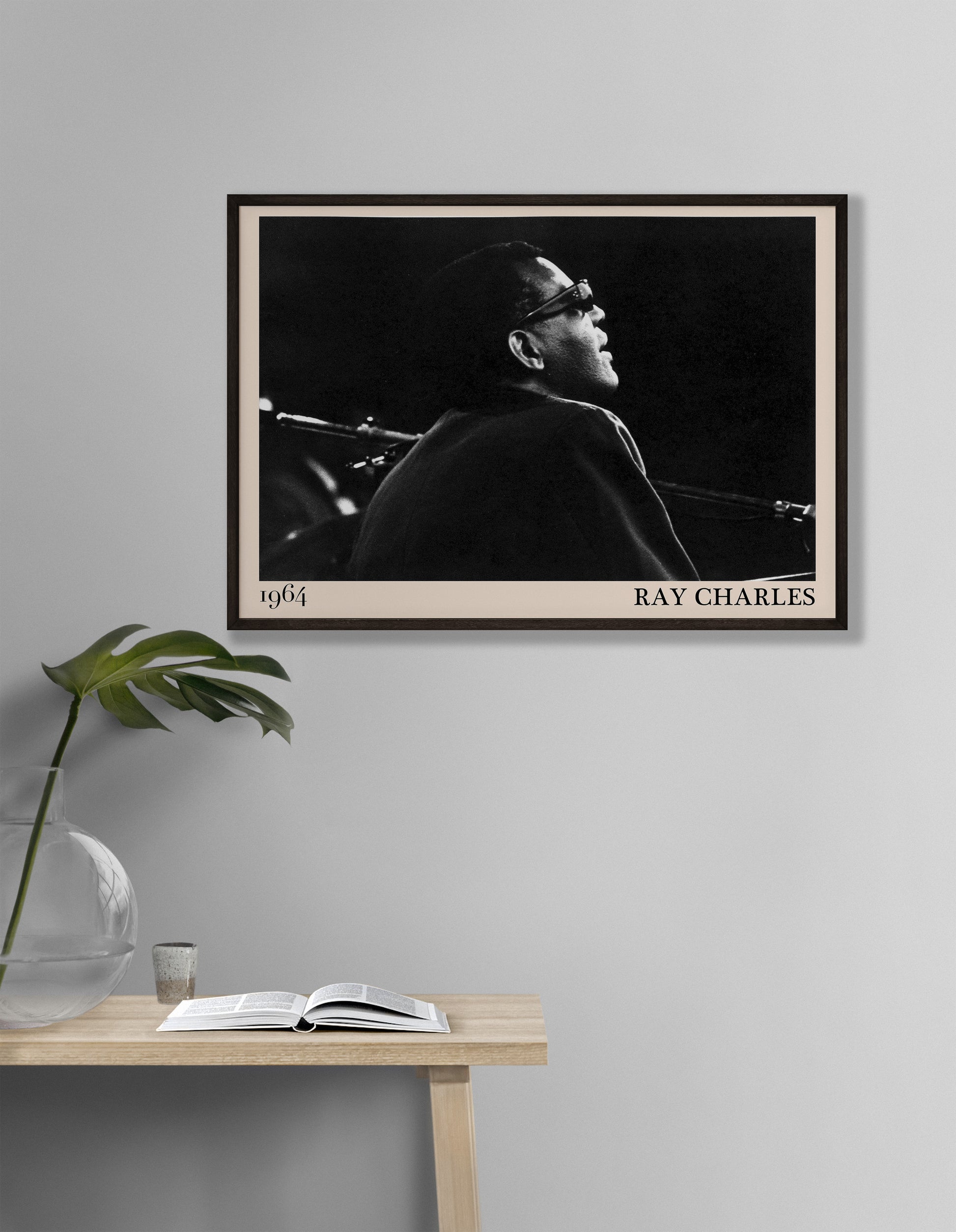 1964 photograph of blues legend Ray Charles, transformed into a cool black-framed poster hanging on a white living room wall