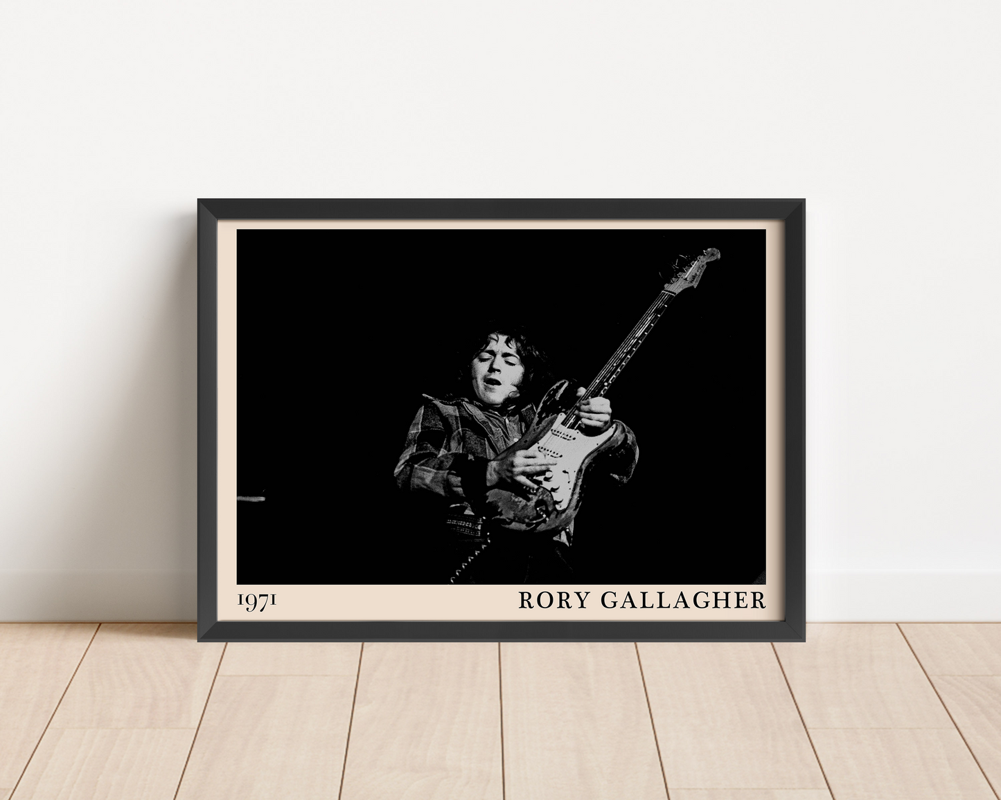 Iconic image of rock musician Rory Gallagher performing, captured by Heinrich Klaffs and transformed into vintage-inspired wall decor