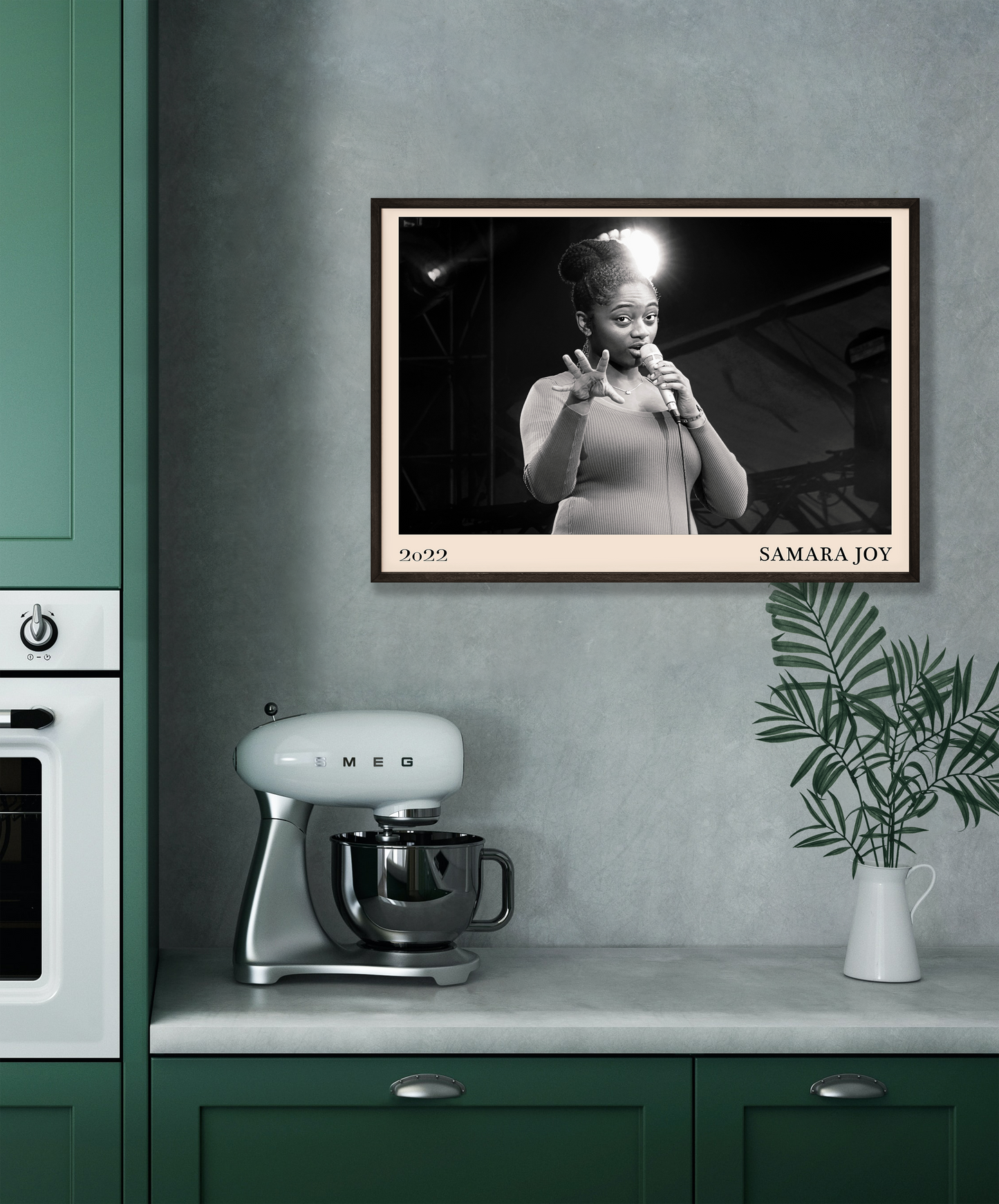 2022 photo of Samara Joy crafted into a black framed-poster, hanging on a grey kitchen wall