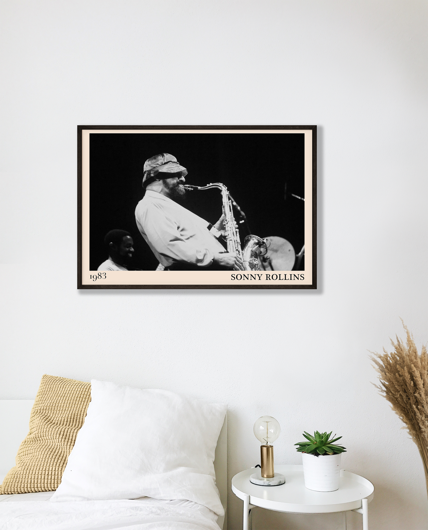 1989 photograph of Sonny Rollins playing the saxophone, transformed into a stylish black-framed jazz poster hanging on a white bedroom wall