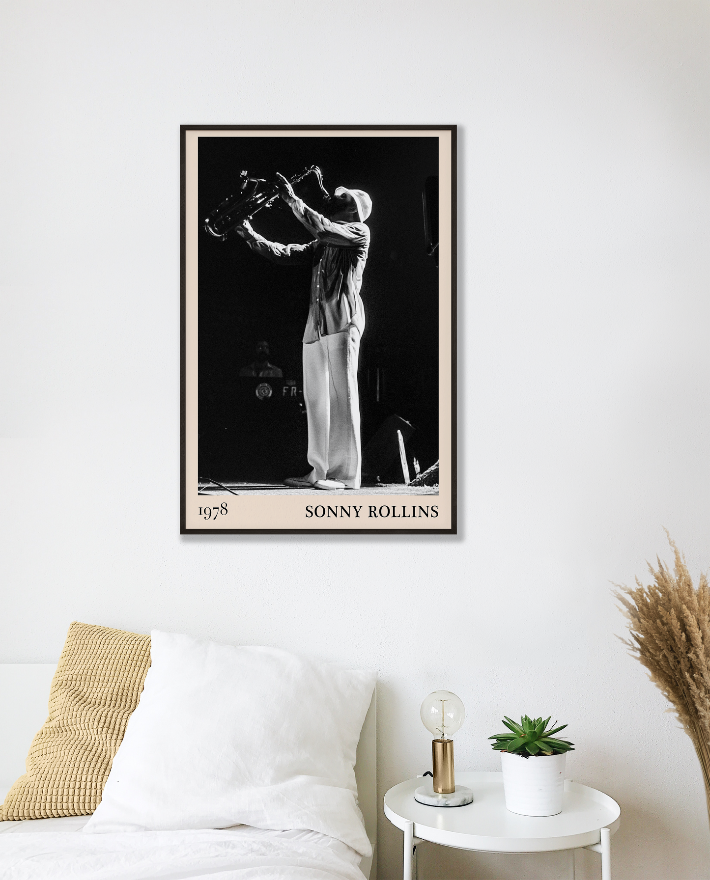 1978 photograph of Sonny Rollins playing the saxophone, transformed into a stylish black-framed jazz poster hanging on a white bedroom wall