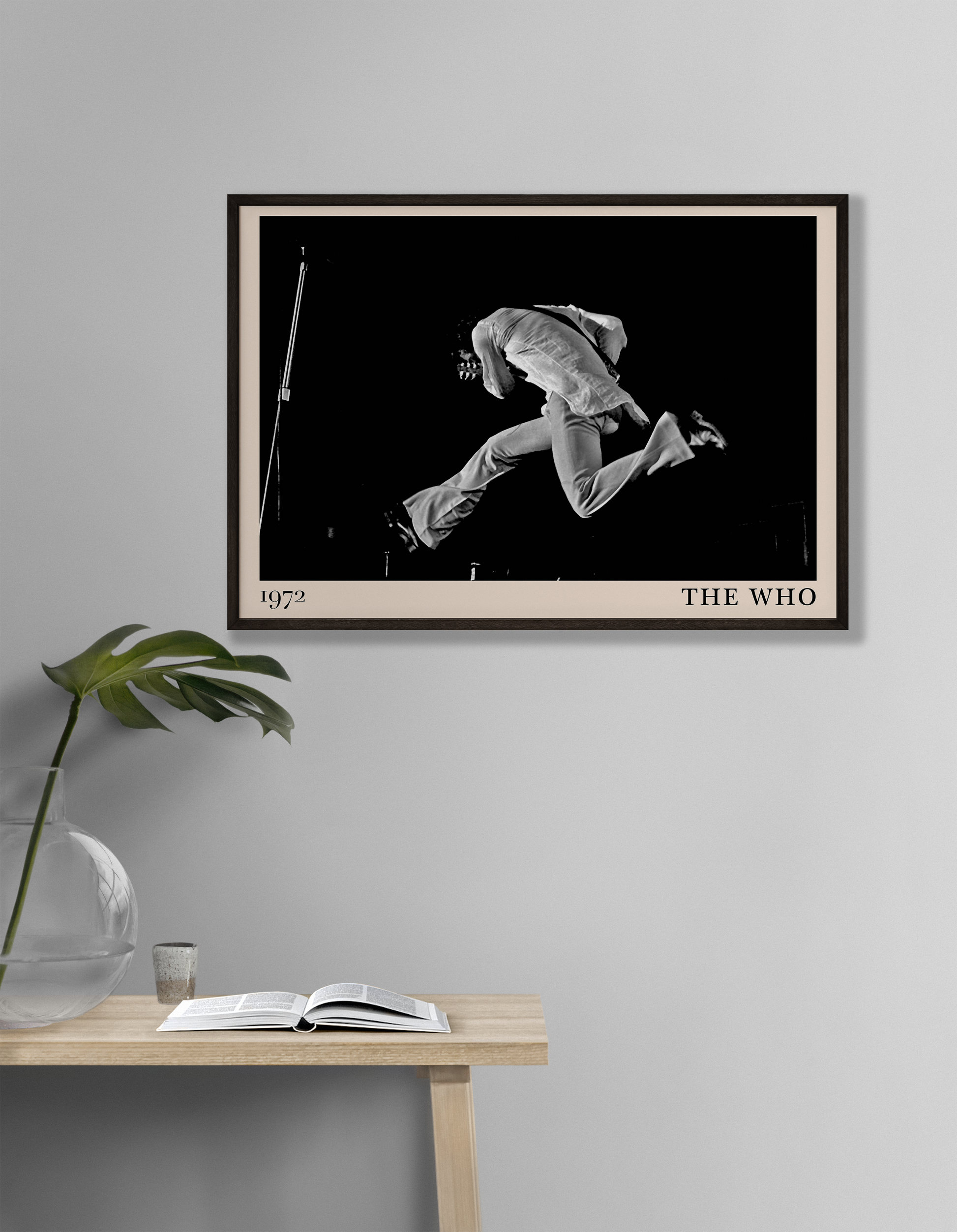 Iconic image of rock band The Who performing, captured by Heinrich Klaffs in 1971 and transformed into vintage-inspired wall decor hanging on a white living room wall
