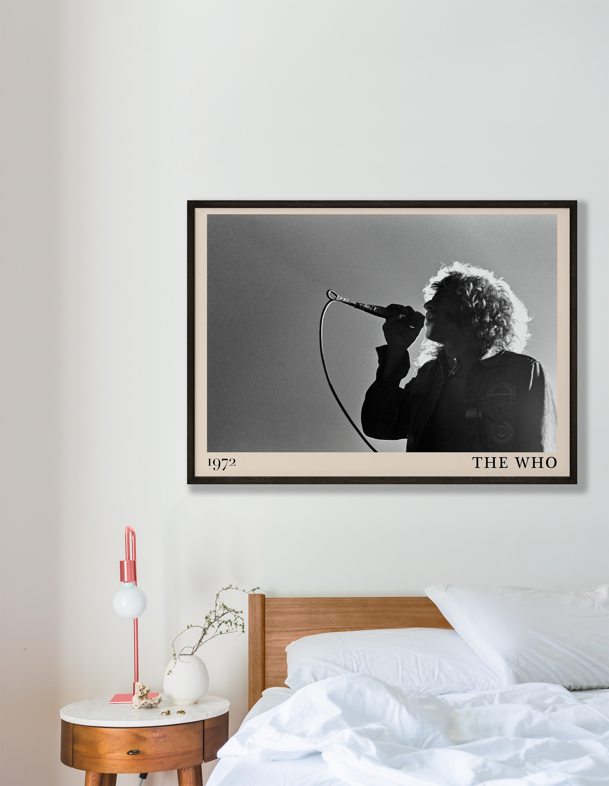 Iconic image of rock band The Who performing, captured by Heinrich Klaffs in 1971 and transformed into vintage-inspired wall decor hanging on a white bedroom wall