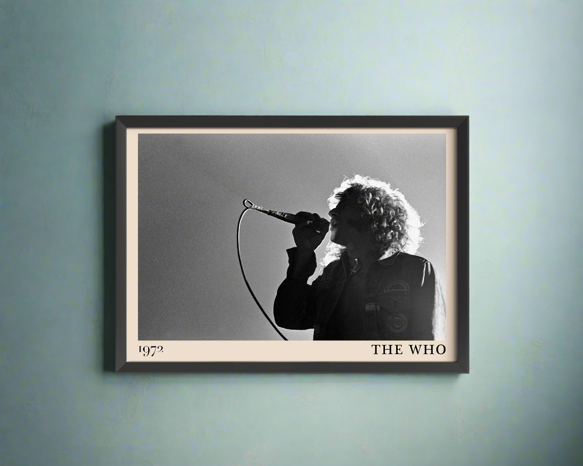 Iconic image of rock band The Who performing, captured by Heinrich Klaffs and transformed into vintage-inspired wall decor, hanging on a light blue rustic concrete wall