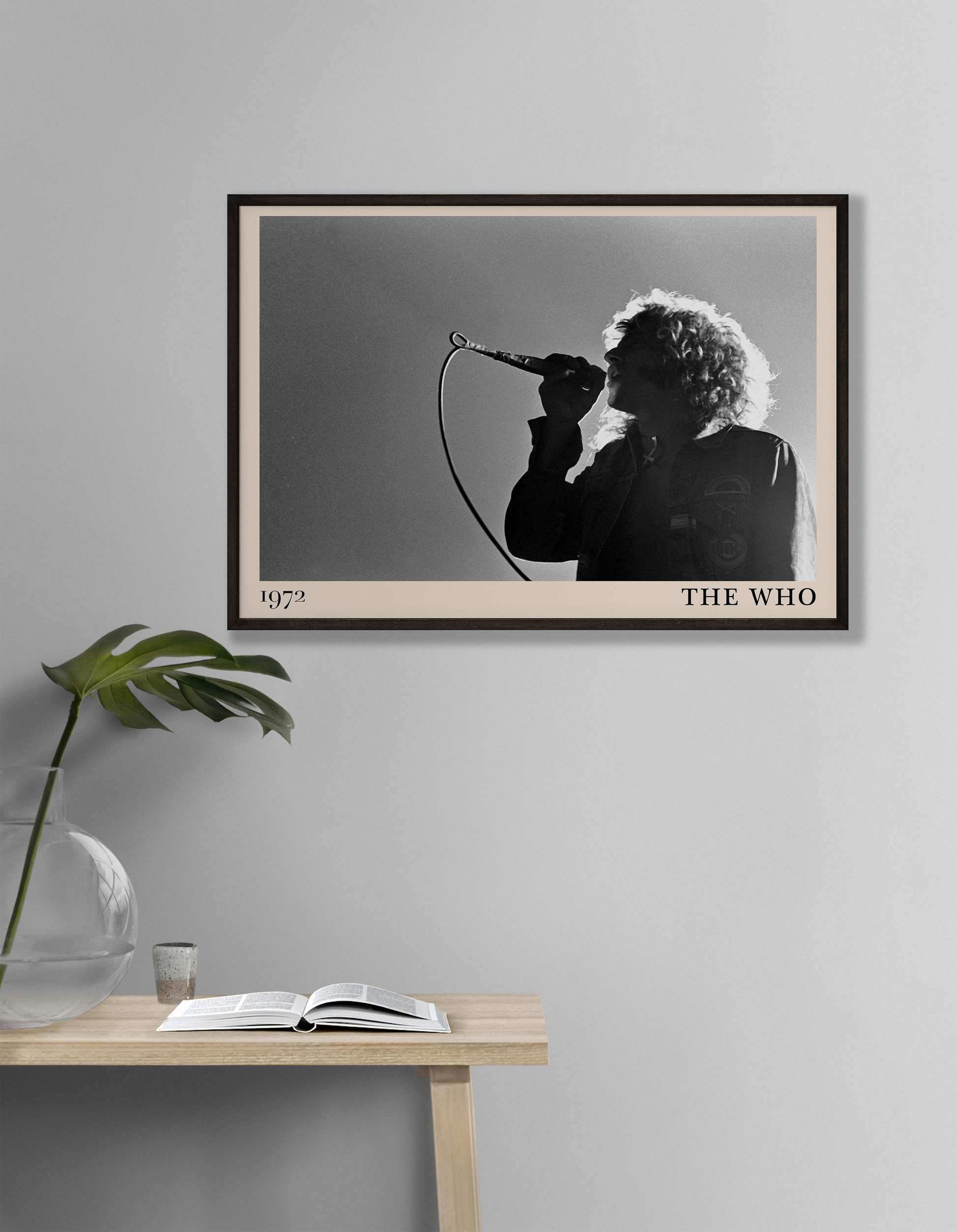 Iconic image of rock band The Who performing, captured by Heinrich Klaffs in 1971 and transformed into vintage-inspired wall decor hanging on a white living room wall