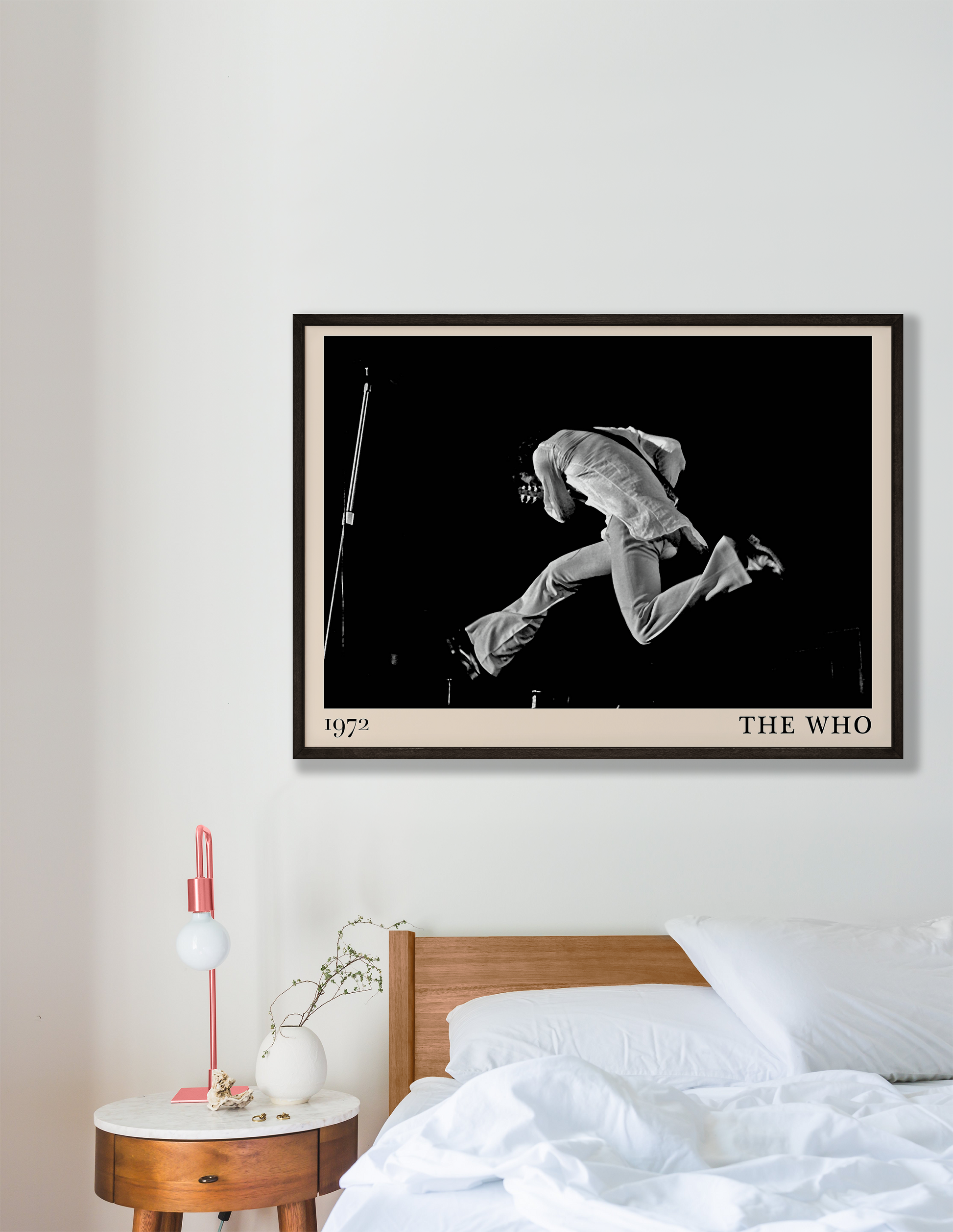 Iconic image of rock band The Who performing, captured by Heinrich Klaffs in 1971 and transformed into vintage-inspired wall decor hanging on a white bedroom wall