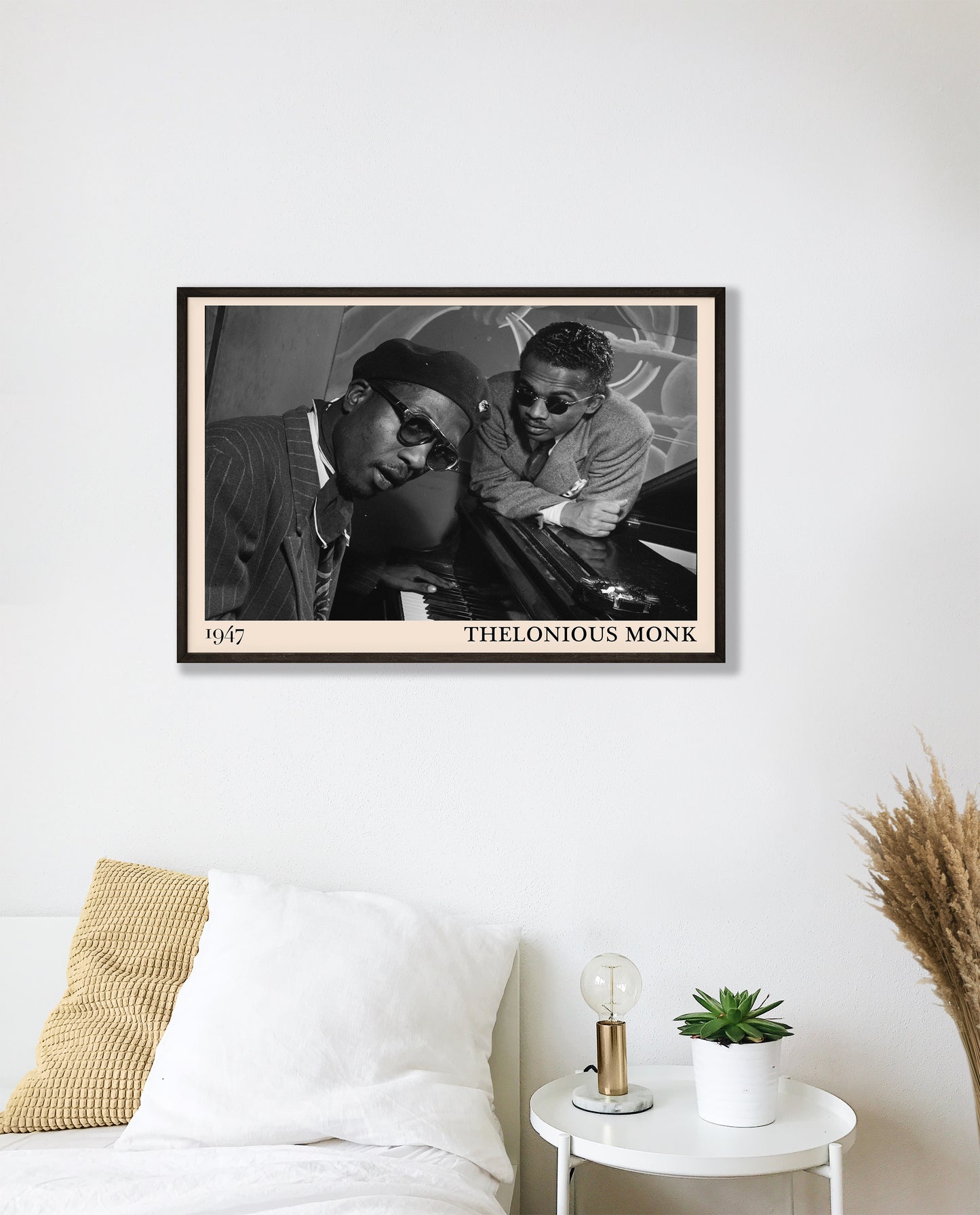 1947 photo of Thelonious Monk, crafted into an elegant black-framed print. Hanging on a white bedroom wall