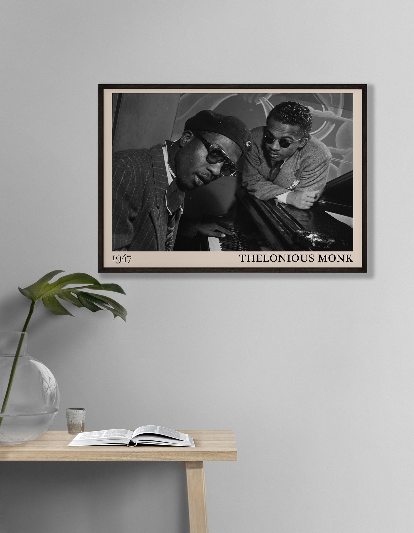 1947 photo of Thelonious Monk, crafted into an elegant black-framed print. Hanging on a white living room wall
